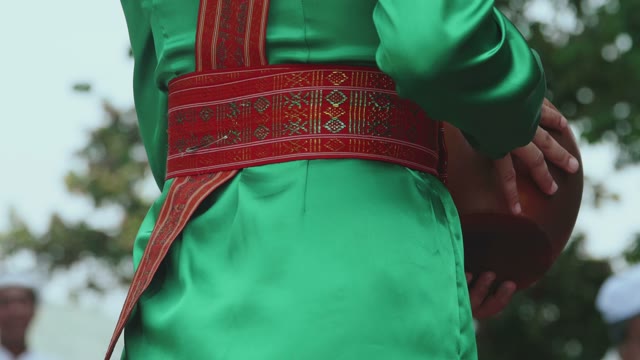 Girl Dancing With A Pot Close-up