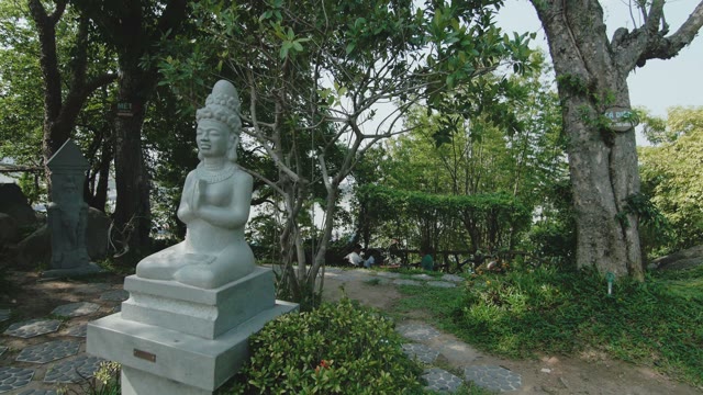 Statue Of A Buddha In The Garden