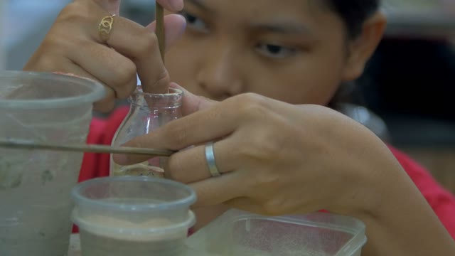 Asian Girl Is Engaged In Decoration Gifts