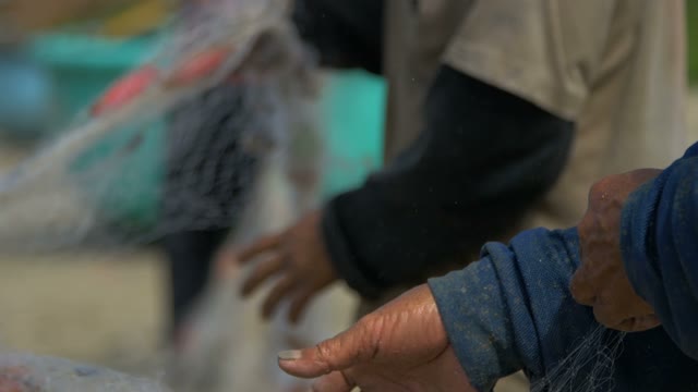 Male Hands Are Twisted The Fishing Net