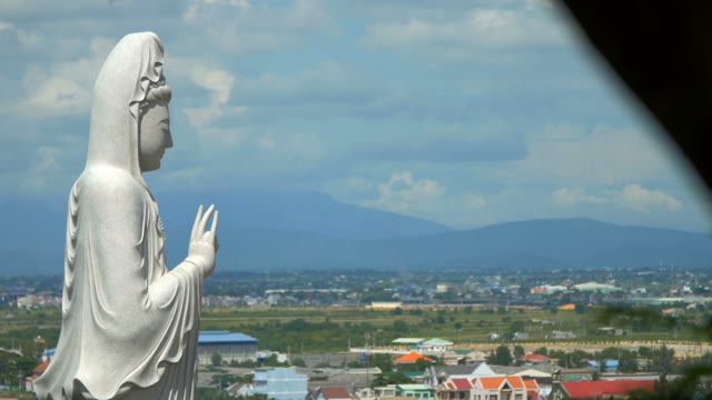 Big White Buddha On A Background Of The Urban Landscape