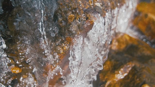 Waterfall With Crystal Clear Water Close-up
