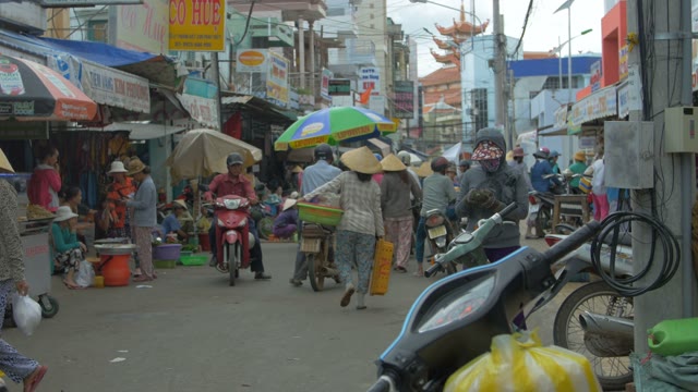 Crowded Asian Market In The Smog And Bustle