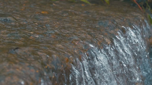 Waterfall With Crystal Clear Water Close-up