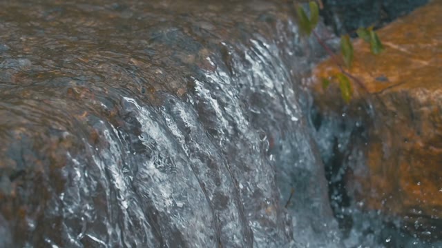 Waterfall With Crystal Clear Water Close-up