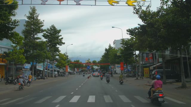 Roadway And Pedestrian Crossing With Motorcyclists