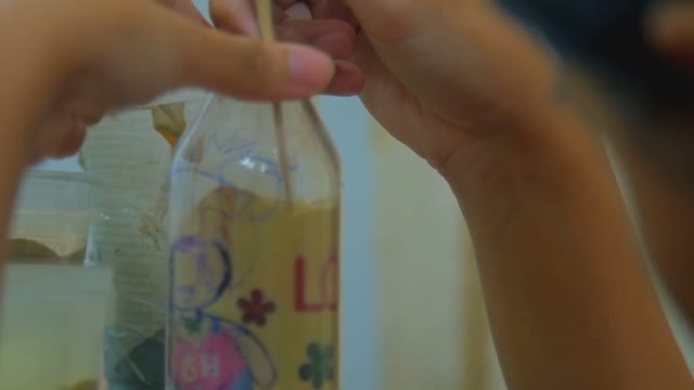Souvenir Vase With Sand And Children's Drawings
