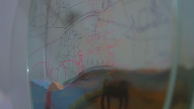 Children's Drawings On Translucent Surface