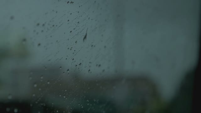 Melancholy Rain Drops On The Glass In Overcast Day