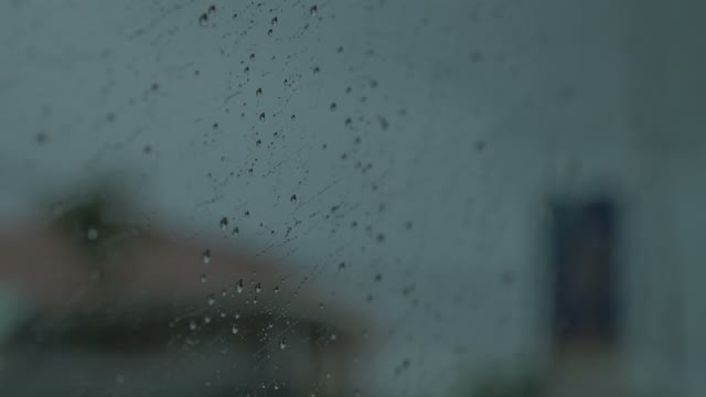 Cloudy Day And Raindrops On The Glass Of The Machine