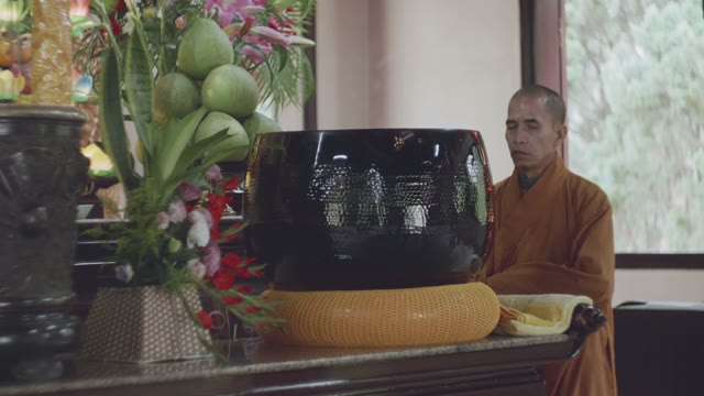 Monk Has Tapping Bowl