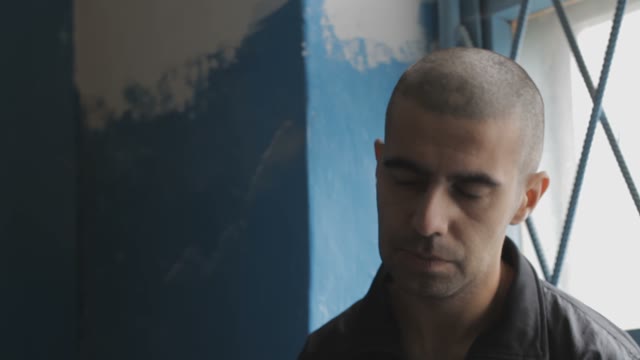 Portrait Of A Prisoner Sitting At The Window Frame