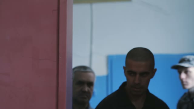 The Bald Guy In A Black Suit Came Through The Door