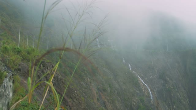 Beautiful High Waterfall In The Mist
