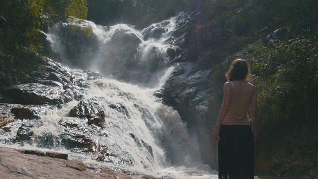 Girl Near Waterfall