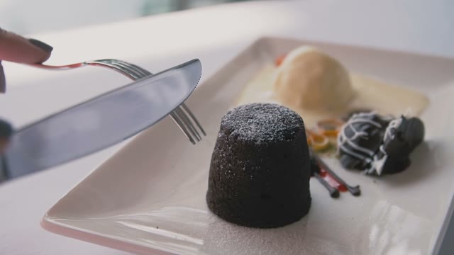 Man Cuts Portion Food