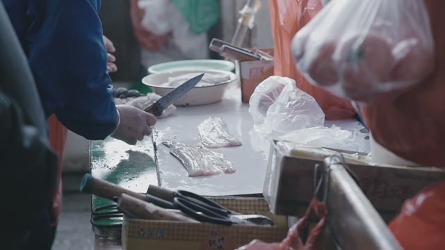 Chef Prepares Sliced Fish For Asian Cuisine