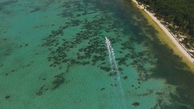 Motorboat Sails By The Sea Near The Shore