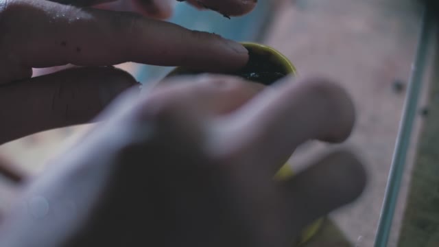 Man Puts Tobacco Close