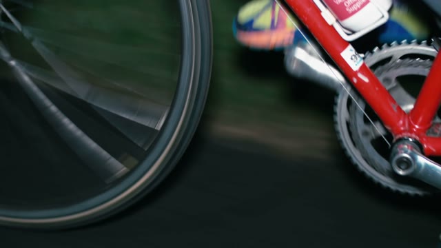 Cyclist Riding A Bicycle At Night Close-up