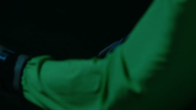 Cyclist Riding At Night Close-up
