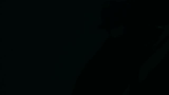 Cyclist Riding At Night Close-up