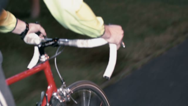 Cyclist Riding At Night Close-up