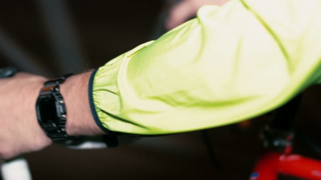 Cyclist Riding A Bicycle At Night Close-up
