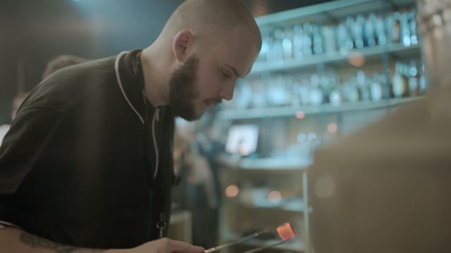 Man Preparing Coal For Hookah Close-up