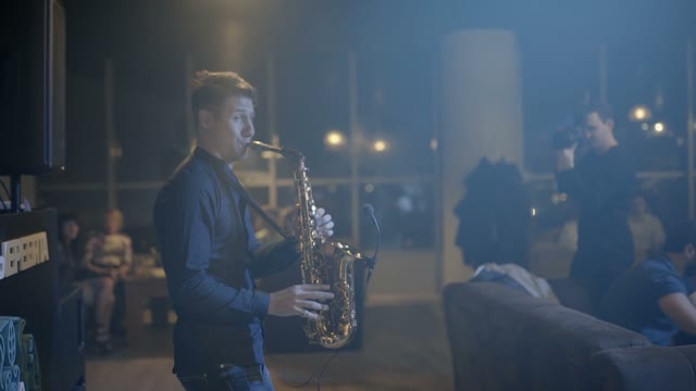 Man Is Playing A Saxophone Close-up