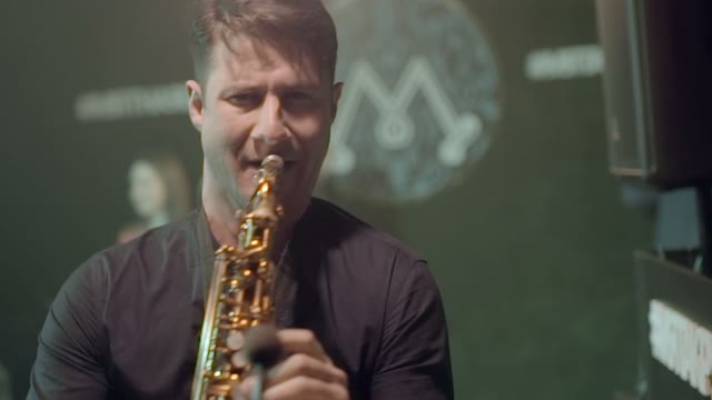 Man Is Playing A Saxophone Close-up