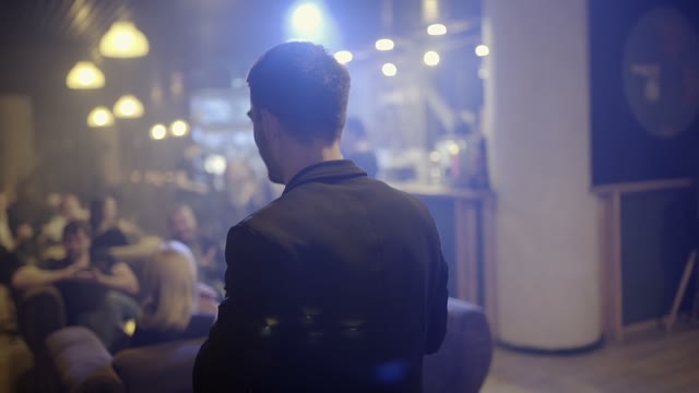 Man Speaks Into The Microphone Close-up