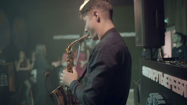 Man Is Playing A Saxophone Close-up