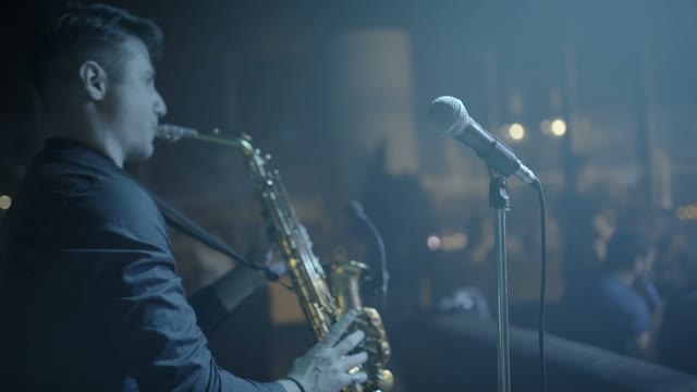 Man Is Playing A Saxophone Close-up