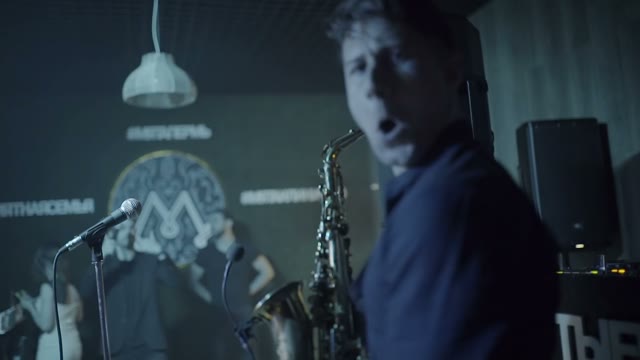 Man Playing The Saxophone In A Nightclub Close-up