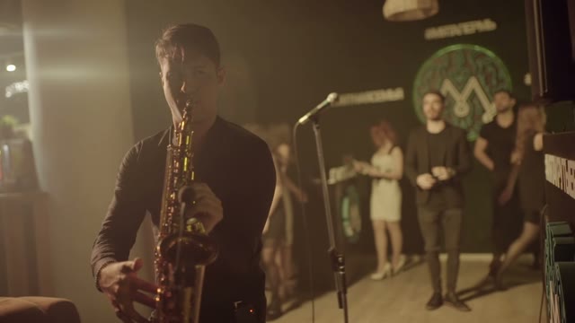 Man Is Playing A Saxophone