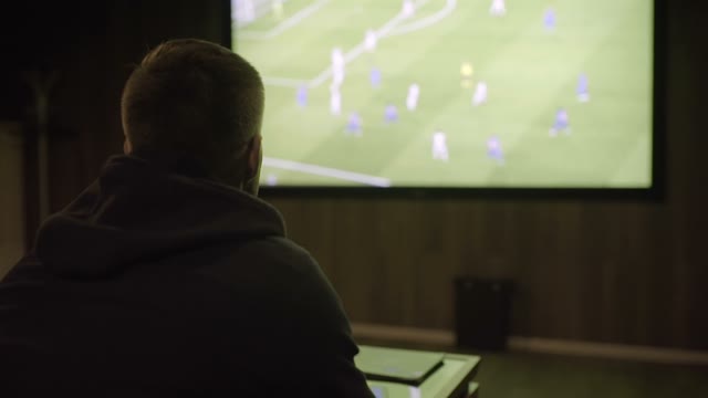 Man Watching Football Close-up