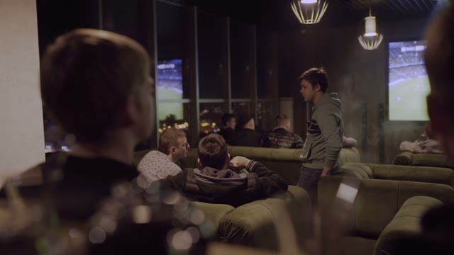 Men Watching Football