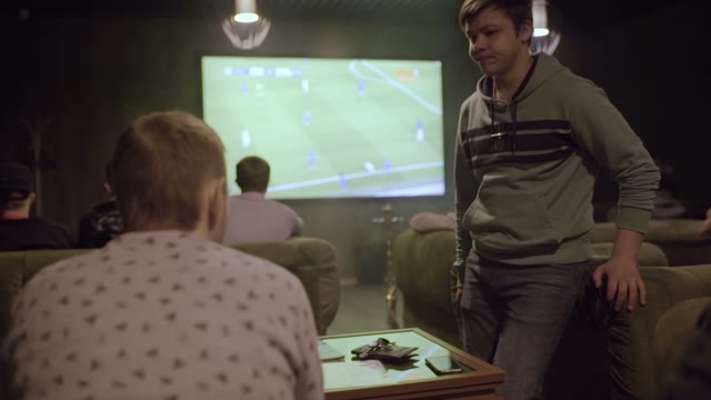 Men Watching Football