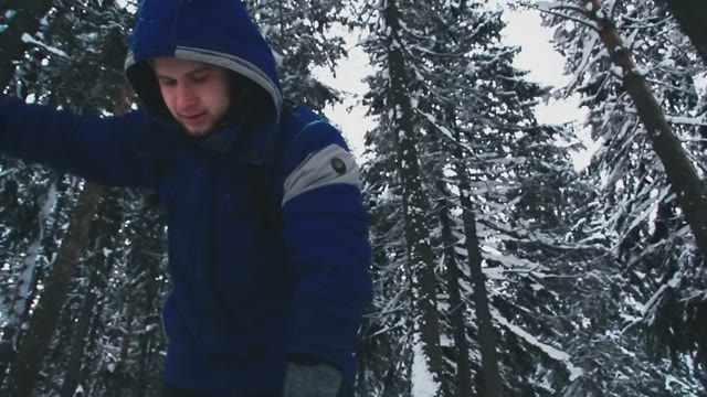 Young Tired Guy Checks His Compass