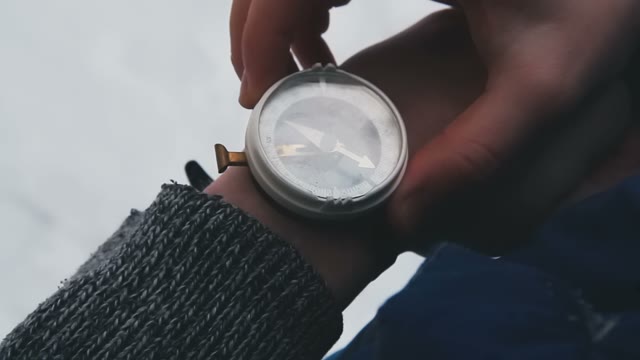 Lost Person Checks The Compass