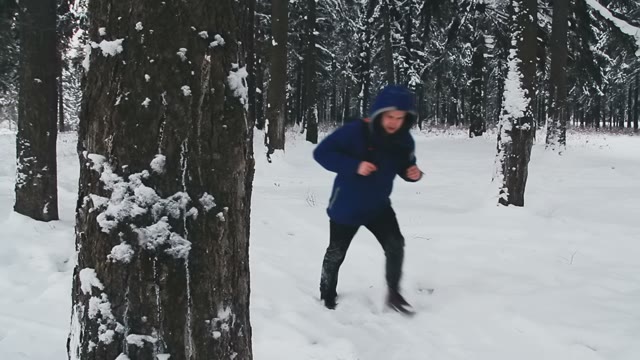 A Tired Young Guy Lost In The Forest Checks The Compass
