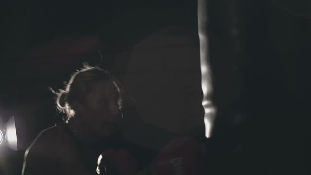 Young Blonde Girl Doing Boxing In The Sport Hall