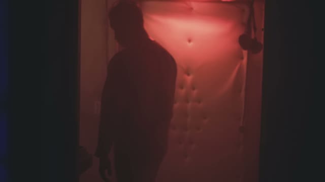 Maniac In A Bloody Robe Wanders Through The Corridors Of An Abandoned Clinic