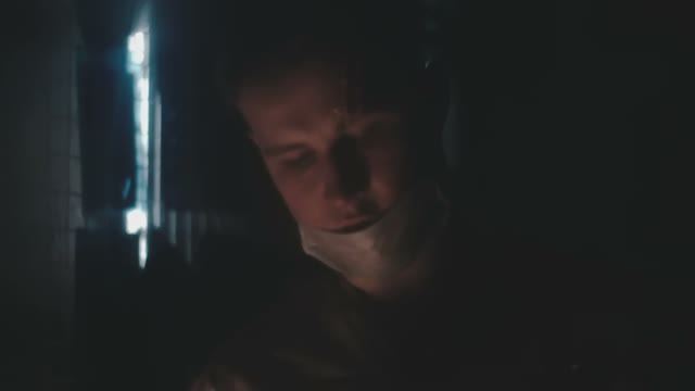 Doctor Maniac With A Terrible Scar On His Forehead Preparing To Kill The Victim