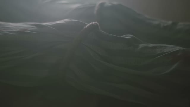 A Man With Bound Legs Lies In A Terrible Place