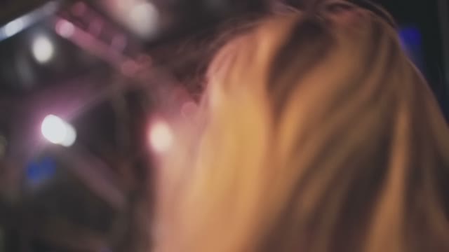 Young Beautiful Girl Is Dancing In The Club