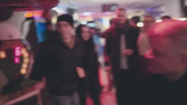 A Young Man Beats A Punching Bag