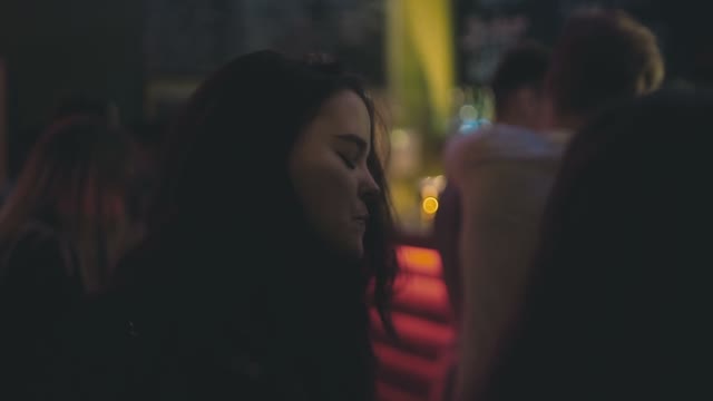 Young Beautiful Charming Girl Dancing In A Bar