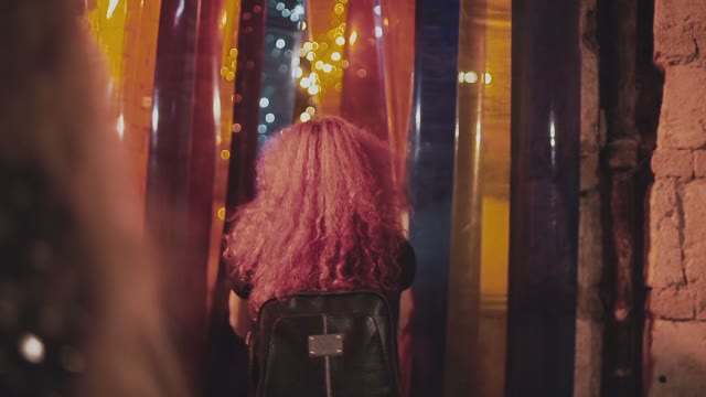 Young Girls Pass Through The Door To The Cafe